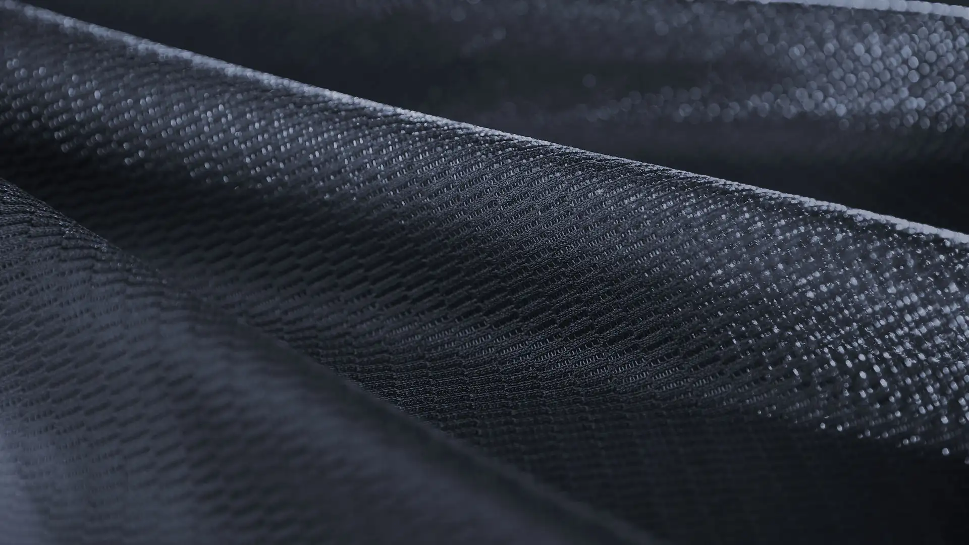 Close-up of SIHOO ergonomic chair’s dual-layer mesh fabric—tightly woven for lumbar support, breathable for all-day comfort in full-mesh designs.